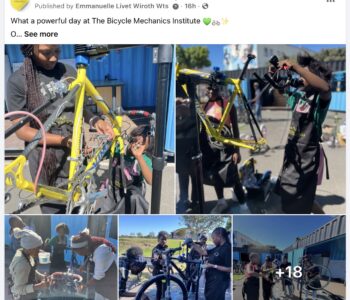 Women learning bicycle repair skills during a practical workshop at the Bicycle Mechanics Institute in South Africa.